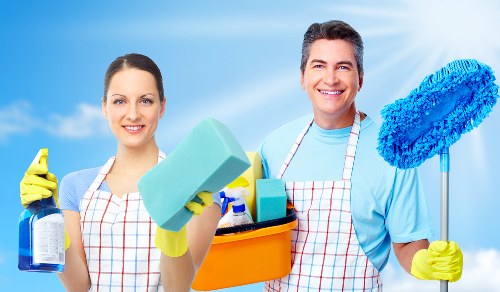 Technician applying cleaning solution with care